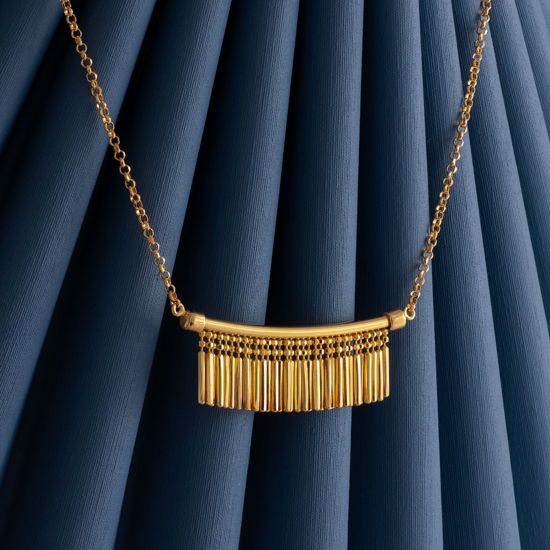 GOLD TASSEL CHARM NECKLACE