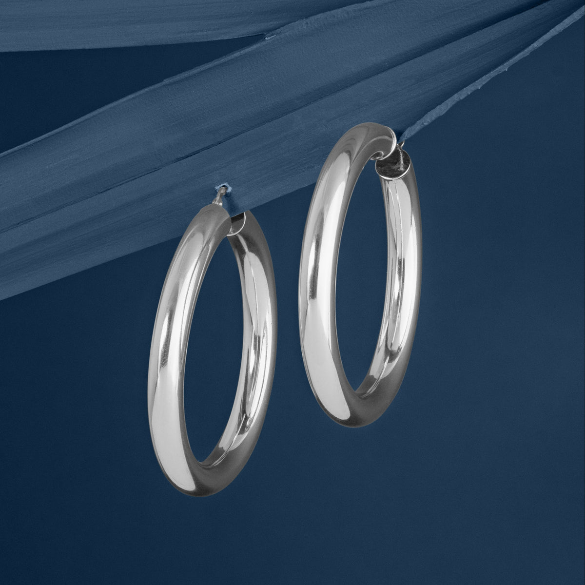 Large Silver Thick Hoop Earrings from LOEL