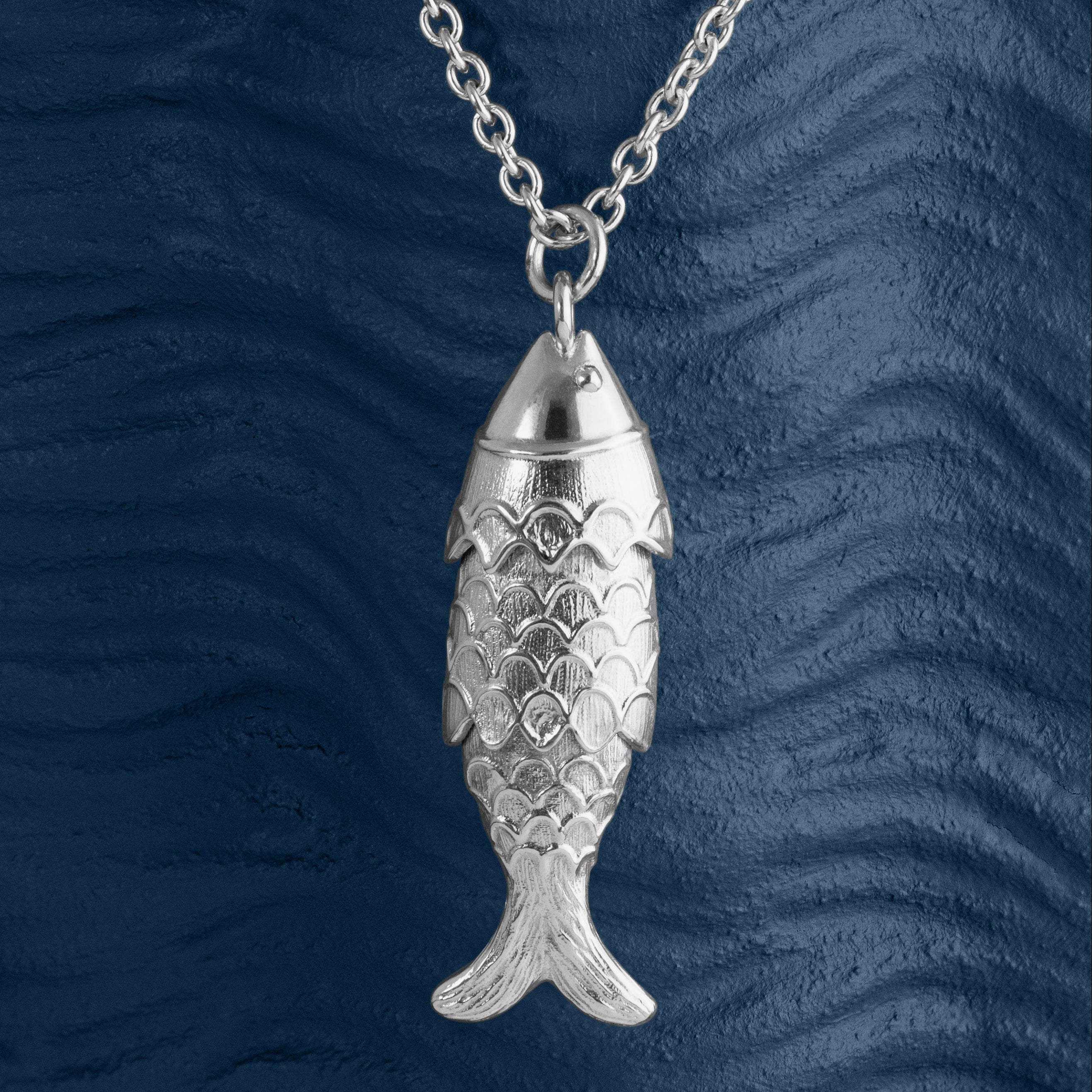 Loel large articulated fish pendant close up
