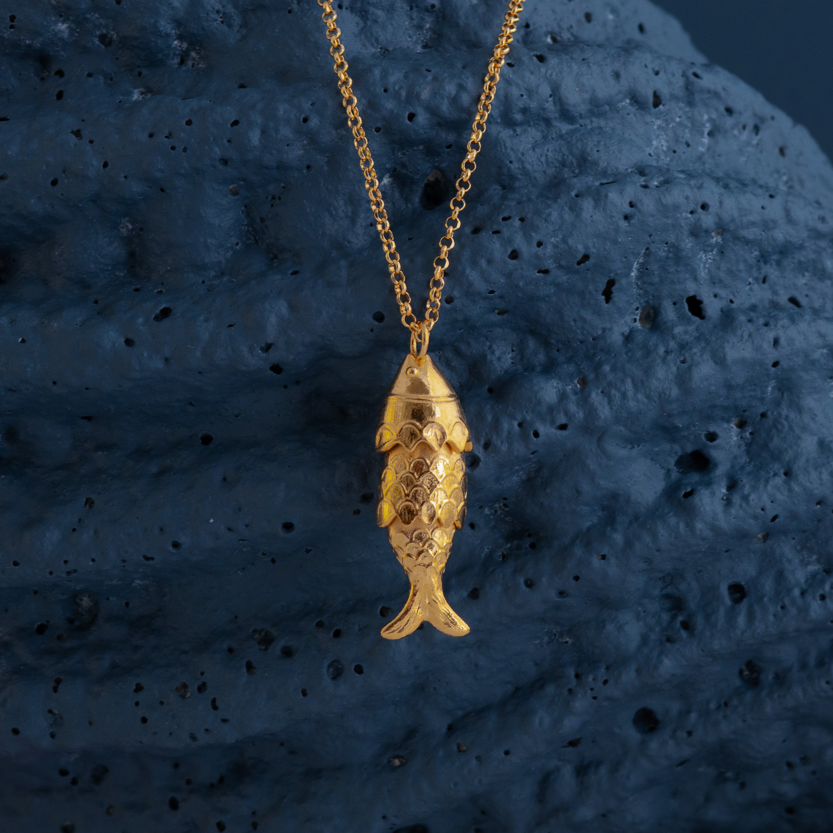 Close up of Loel Gold Fish Pendant Necklace