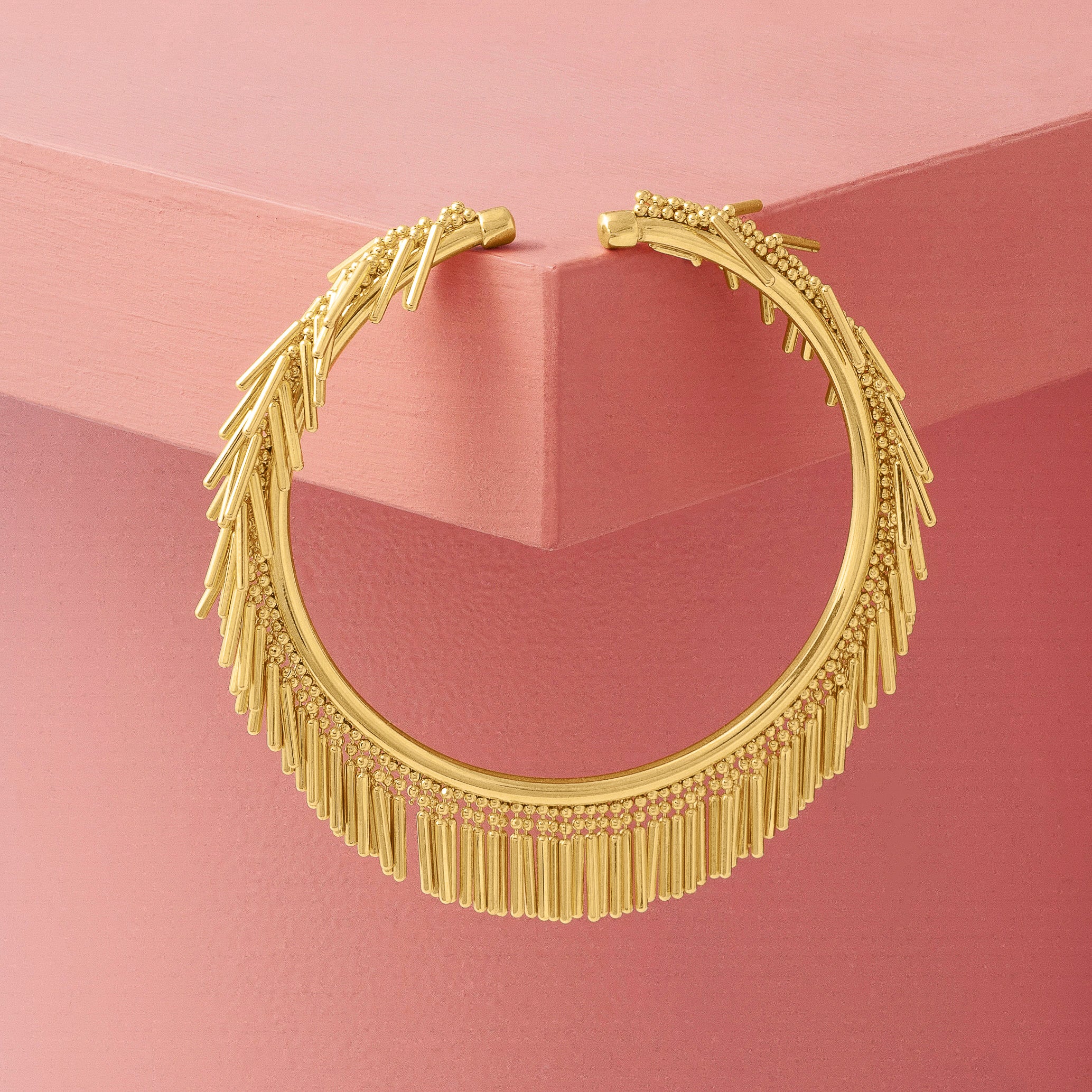 GOLD TASSEL BANGLE