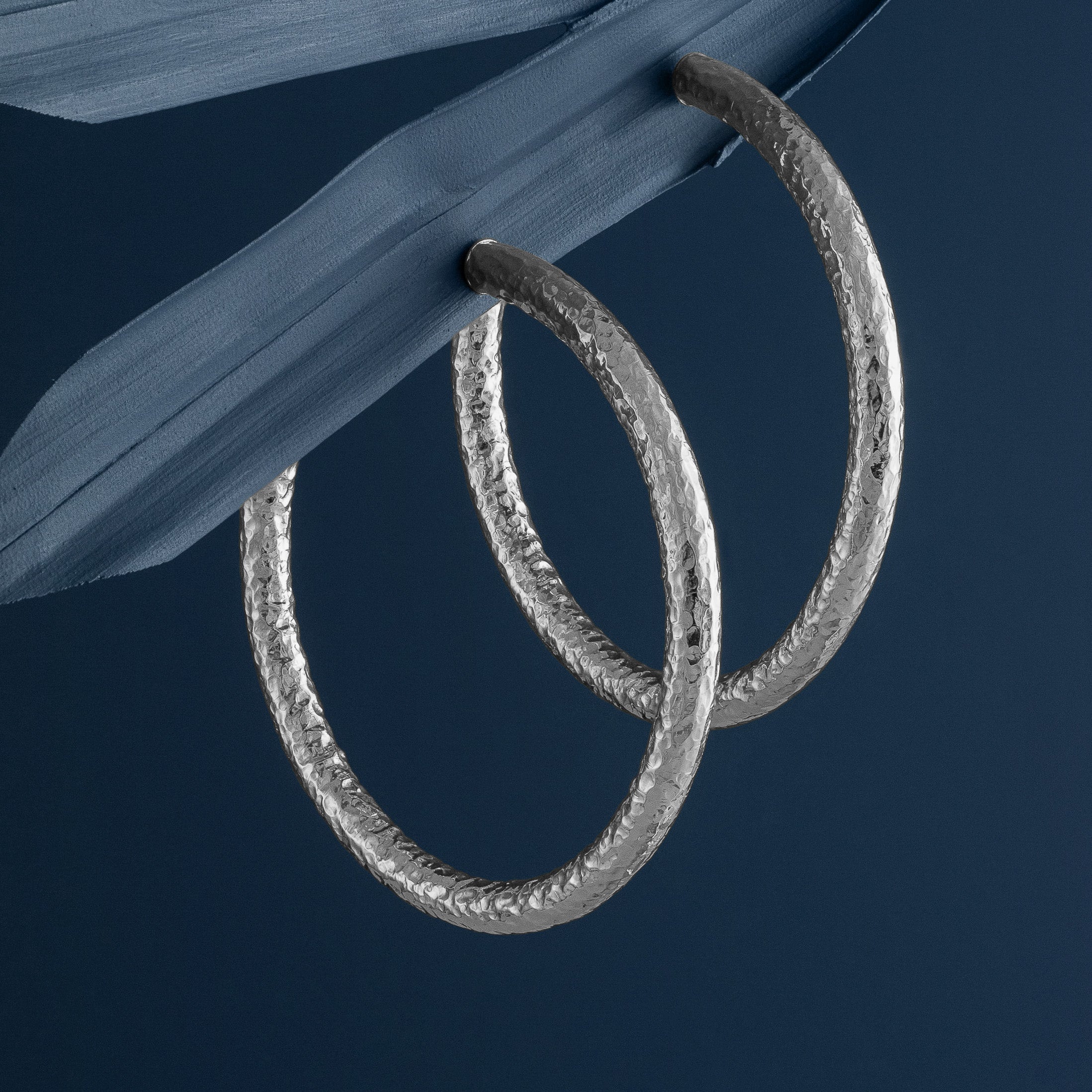 LARGE HAMMERED SILVER HOOP EARRINGS