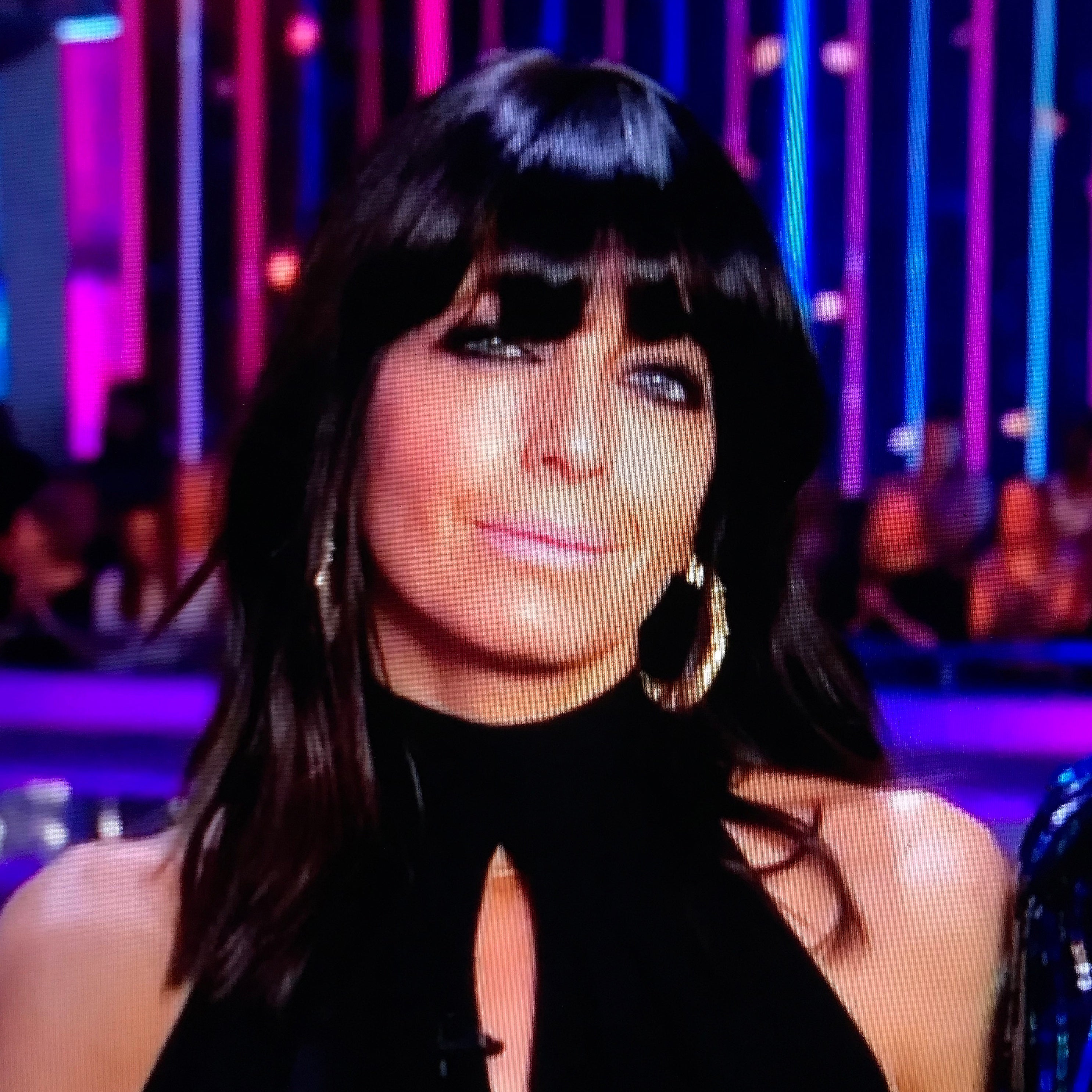 Claudia Winkleman in Loel Gold Tassel Fringe Hoop Earrings