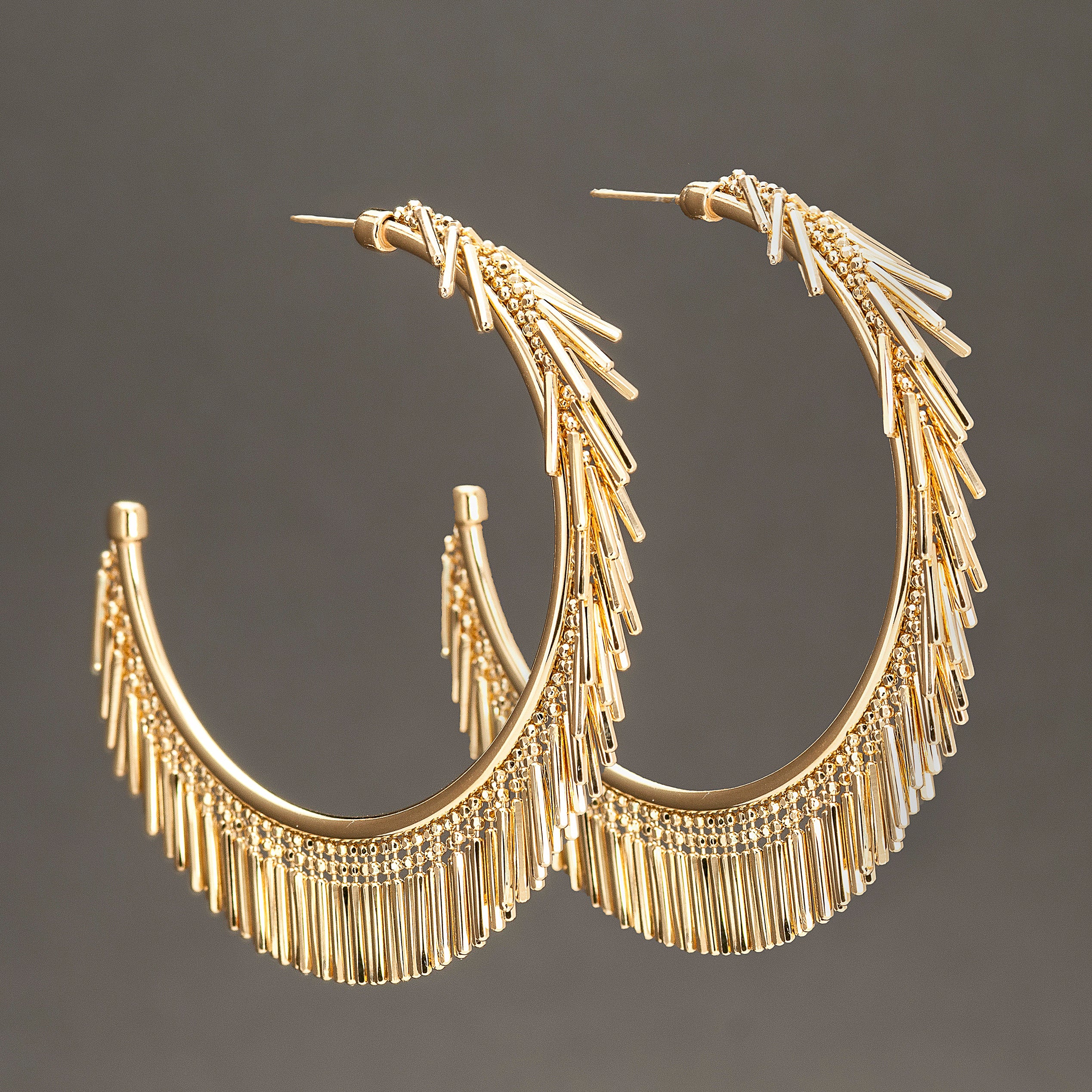LARGE GOLD TASSEL HOOP EARRINGS