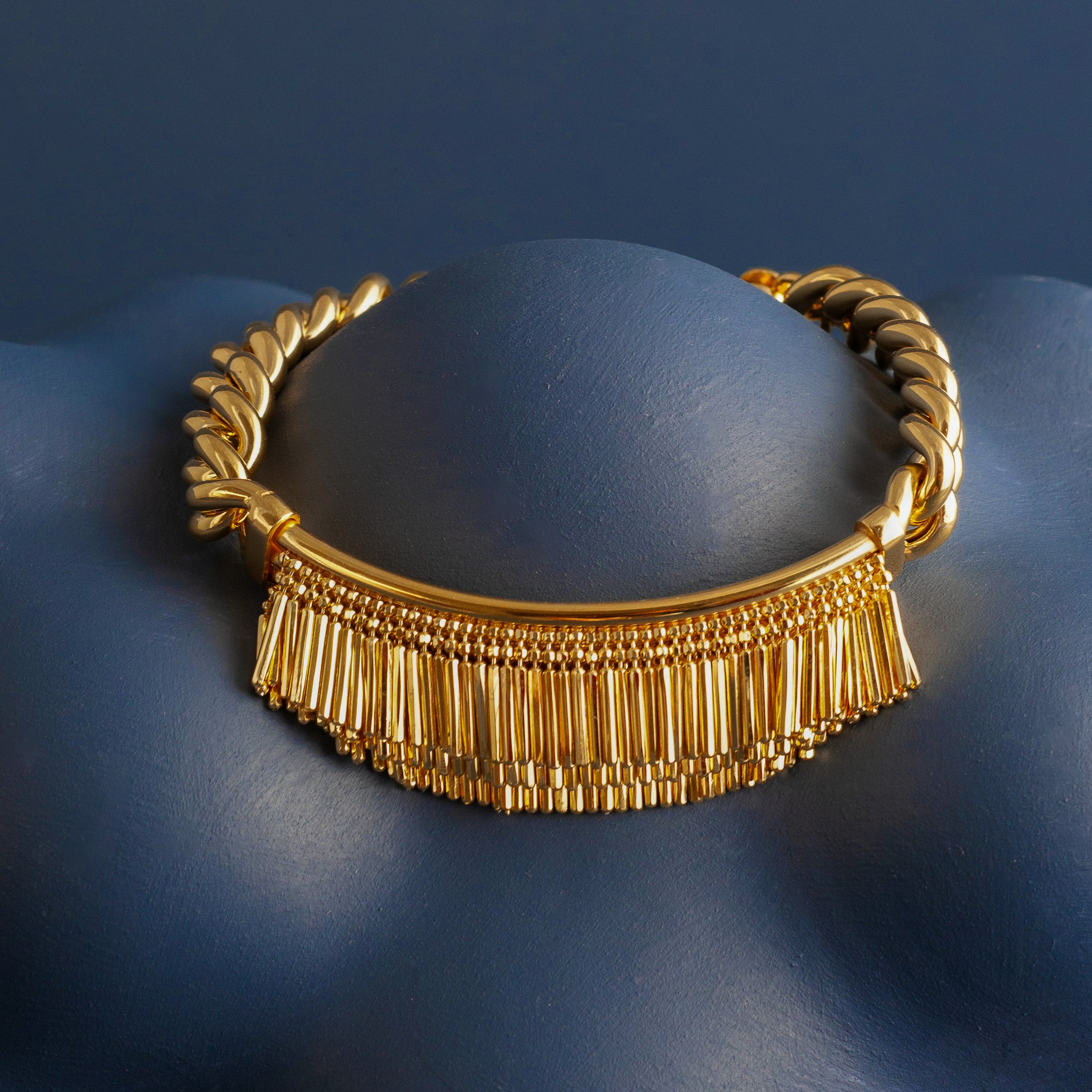 GOLD TASSEL AND CHAIN BRACELET
