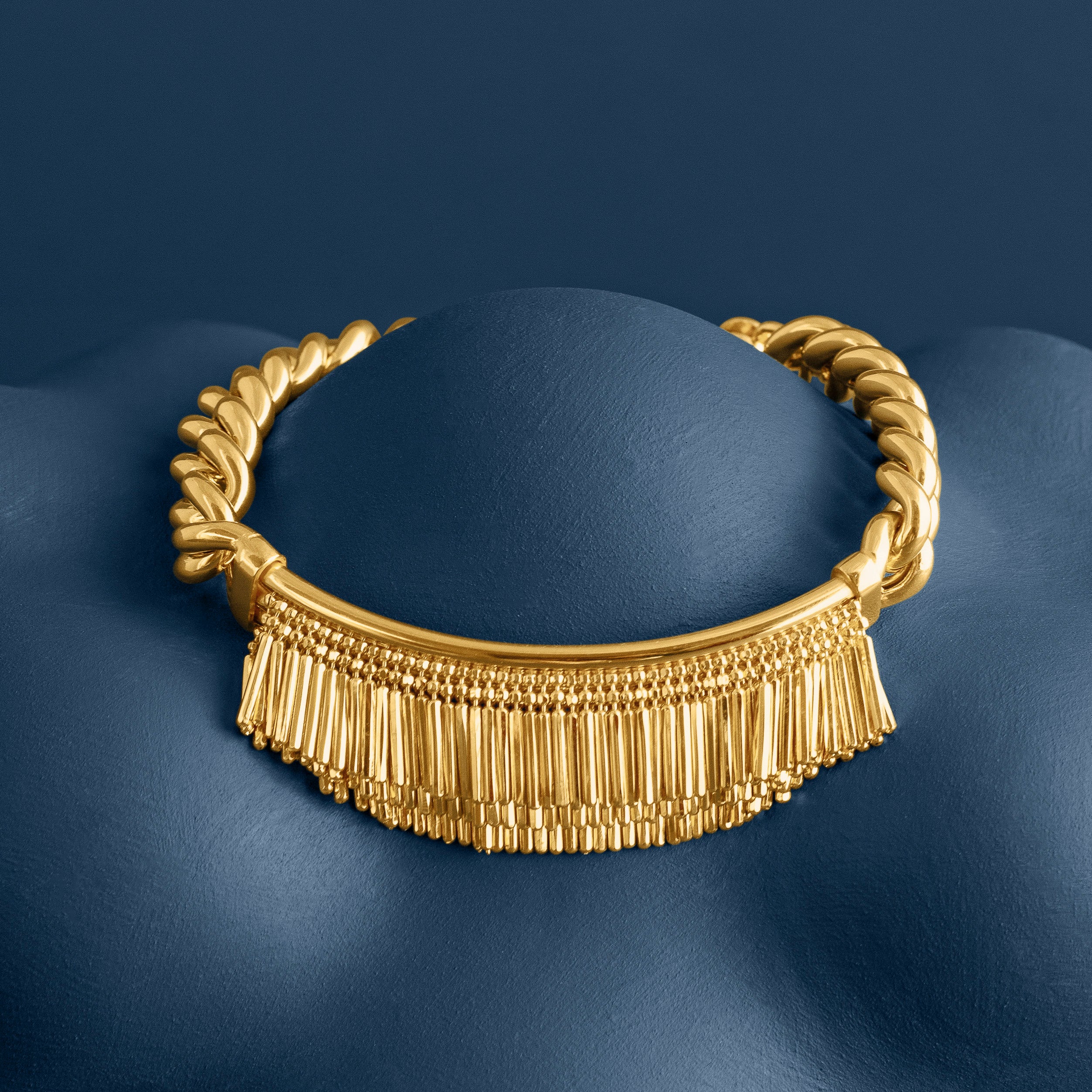 GOLD TASSEL AND CHAIN BRACELET