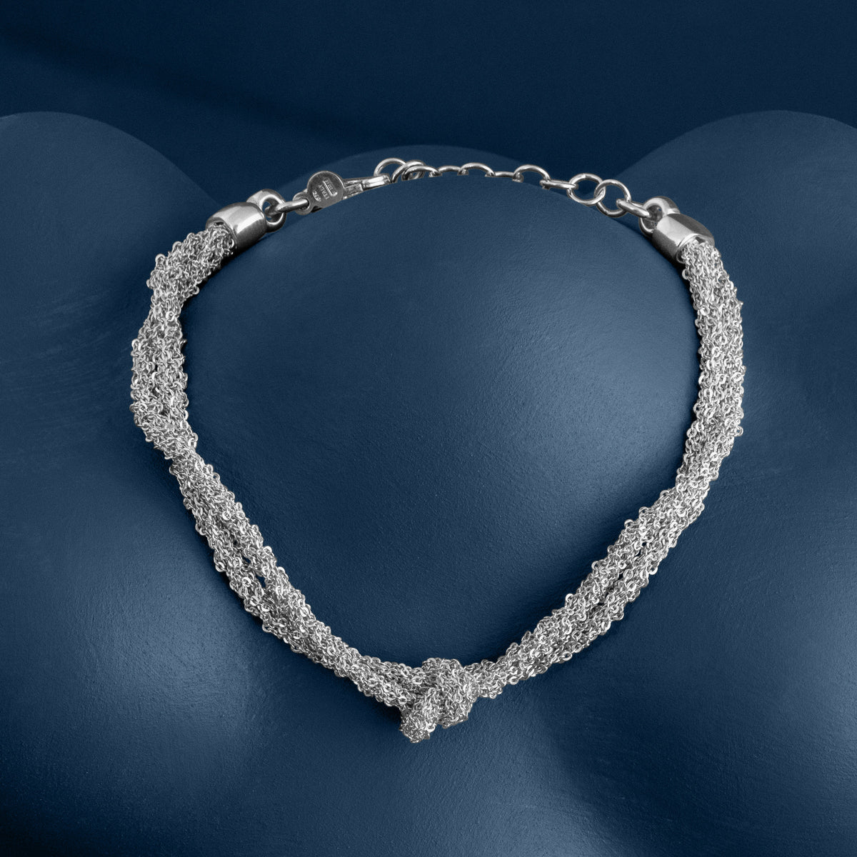LOEL | SILVER WOVEN THREAD DOUBLE KNOT BRACELET