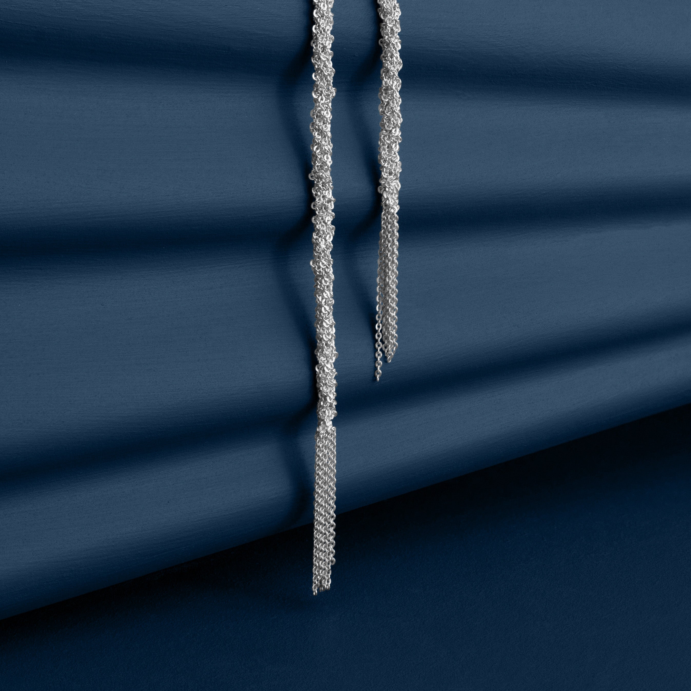 Loel Silver Thread Lariat Necklace close up of tassels 