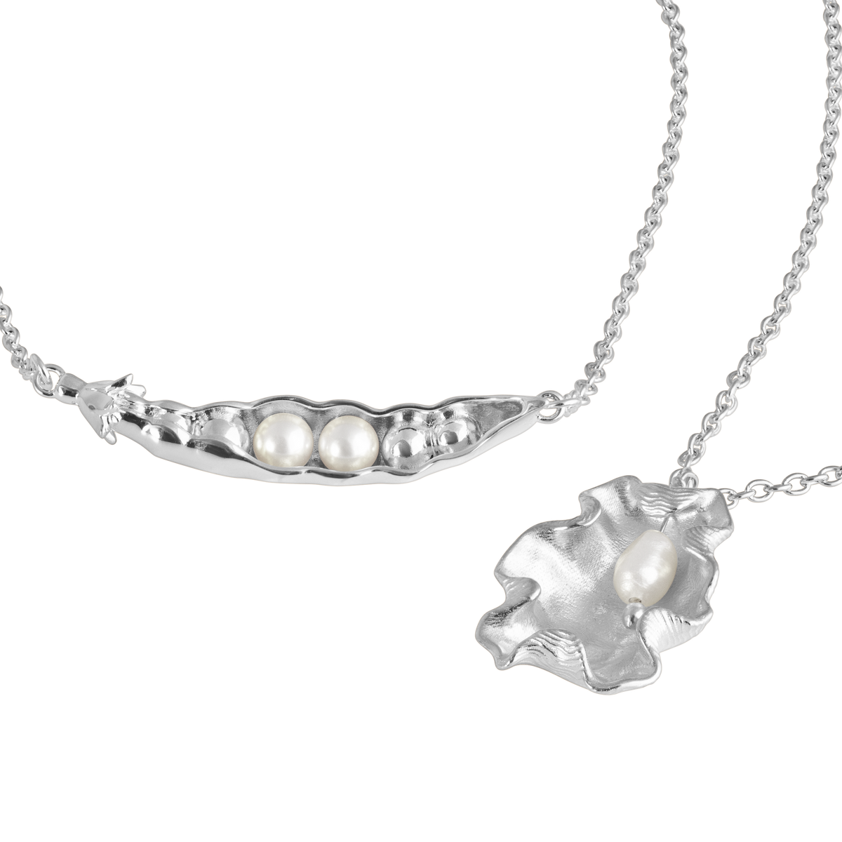 Loel x Minnie Mae Silver Peas in a Pod and Oyster Shell Pendants on white