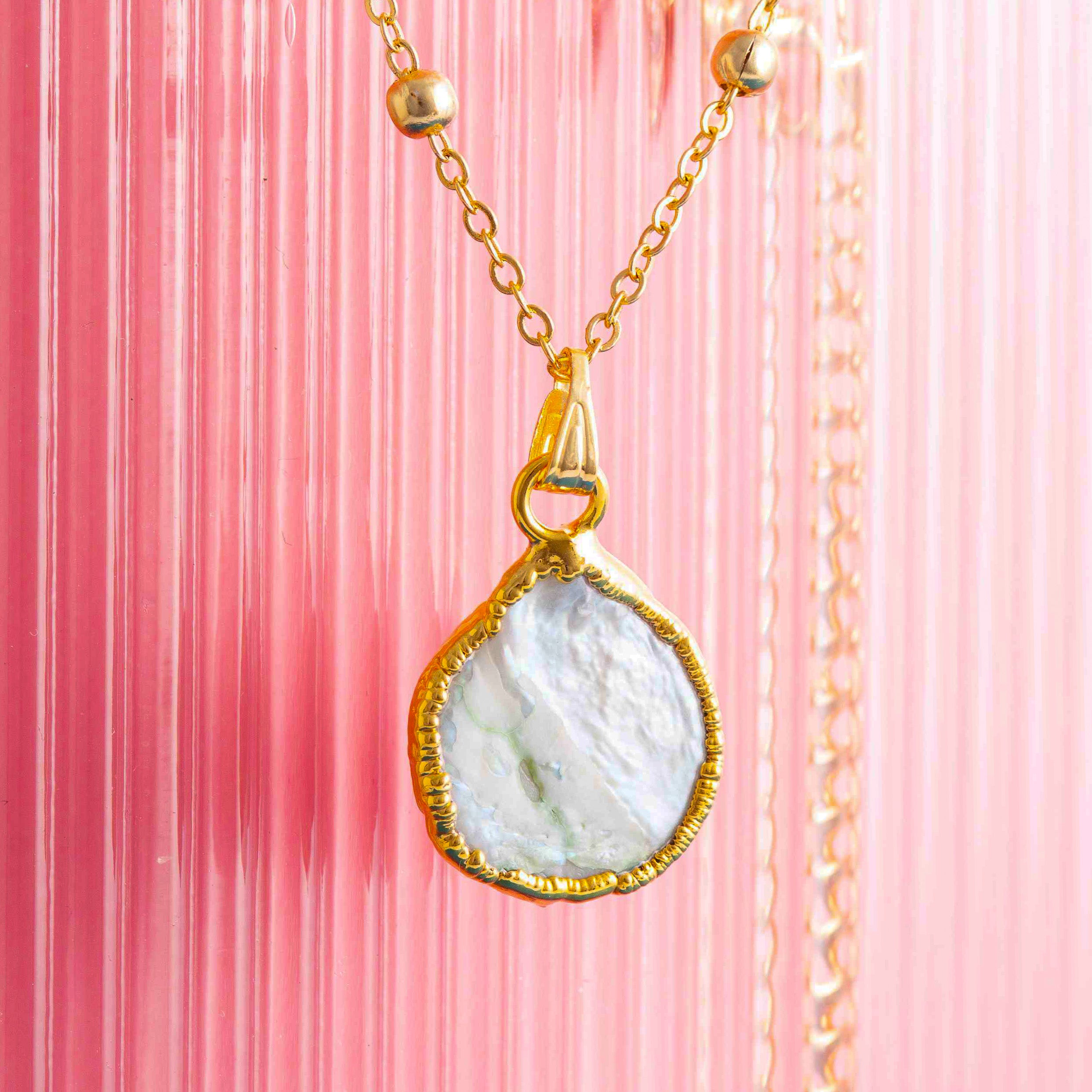 MOTHER OF PEARL CHARM PENDANT